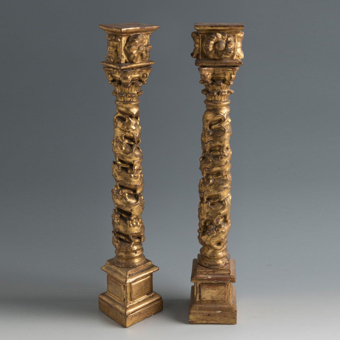 Pair of Spanish giltwood Baroque Solomonic antique columns