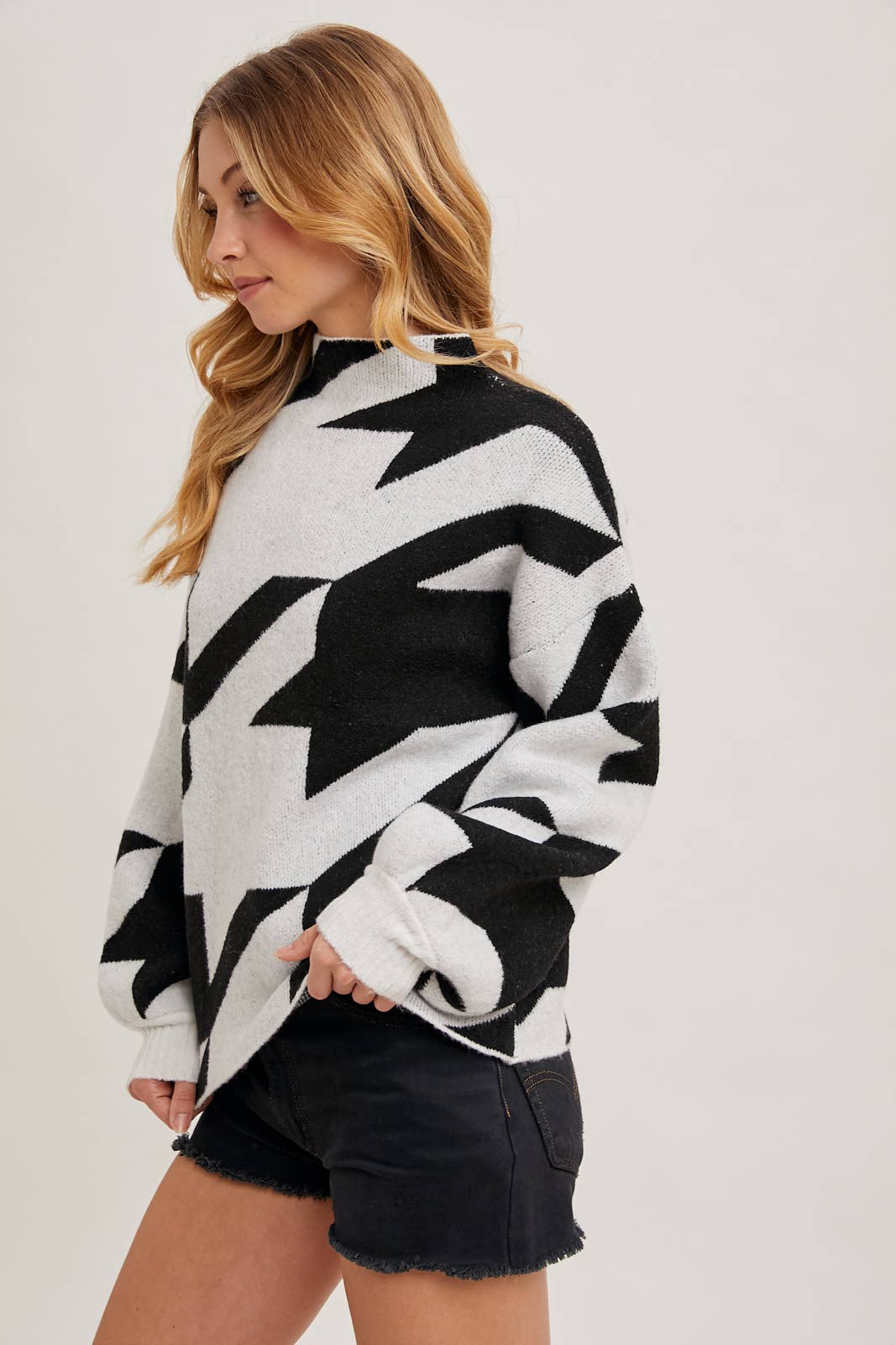 HOUNDSTOOTH MOCK NECK LOOSE FIT KNIT SWEATER IN BLACK AND WHITE available for shopping small in Northern Virginia