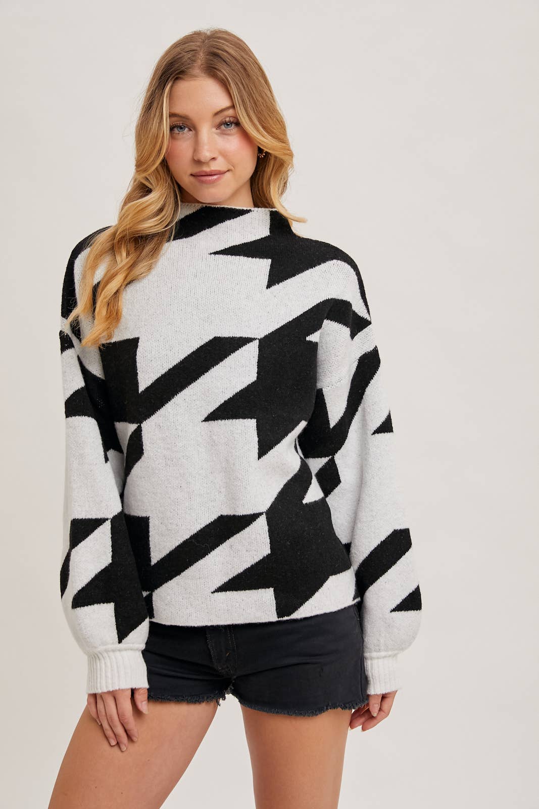 HOUNDSTOOTH MOCK NECK LOOSE FIT KNIT SWEATER IN BLACK AND WHITE available for shopping small in Northern Virginia