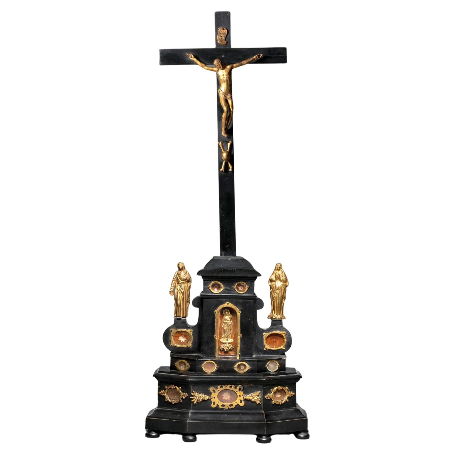 AN EBONY WOOD AND GILT BRONZE RELIQUARY ALTAR CROSS AFTER GIAMBOLOGNA