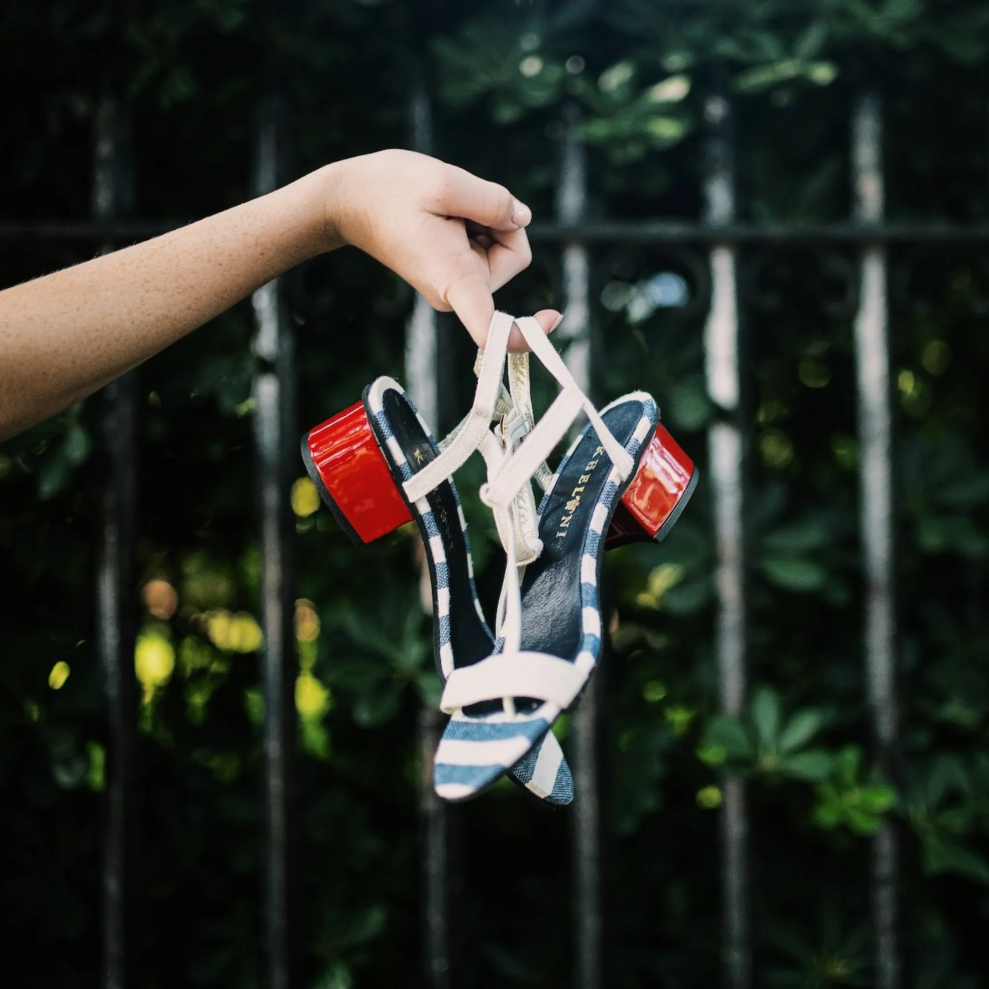 Designer vivid red leather and blue-white striped beach style sandals handmade in Greece by Kheloni