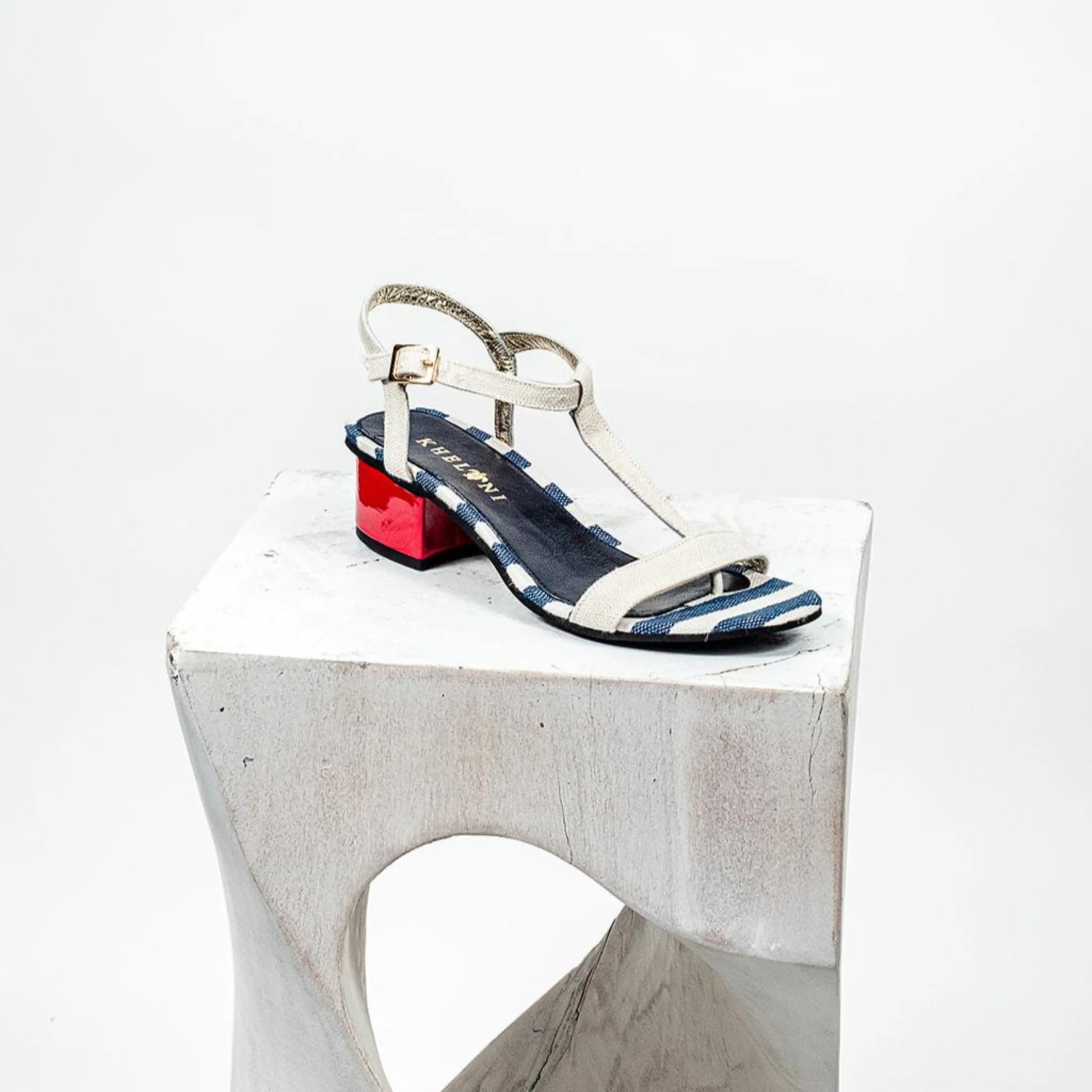 Designer vivid red leather and blue-white striped beach style sandals handmade in Greece by Kheloni