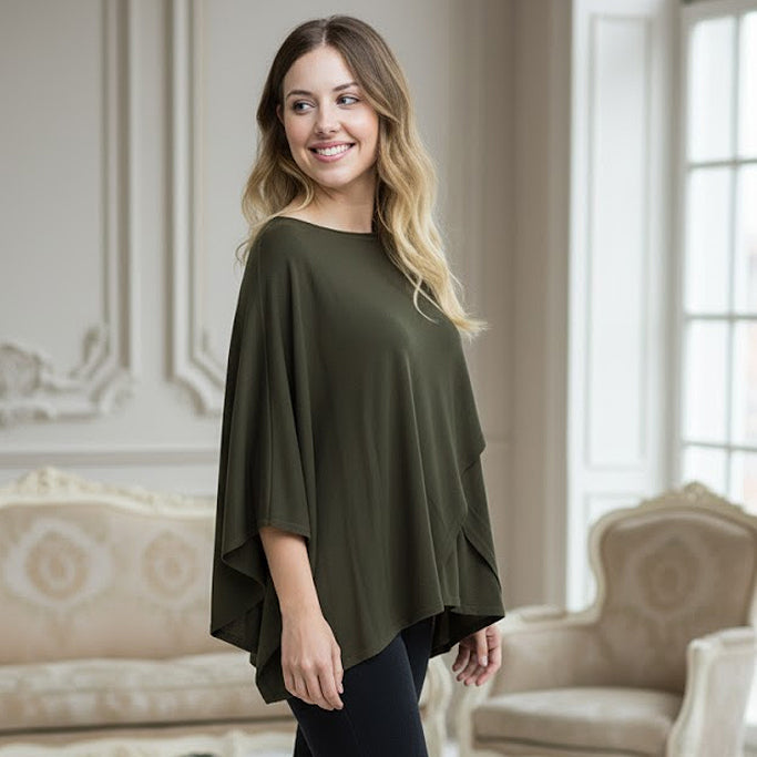 Forest Green Cashmere and Wool Blend Cashmere Poncho worn by a French model in an elegant room