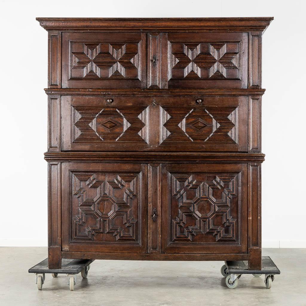 Impressive 18th century oak cabinet with geometric door facades from a fine antique dealer in Loudoun County