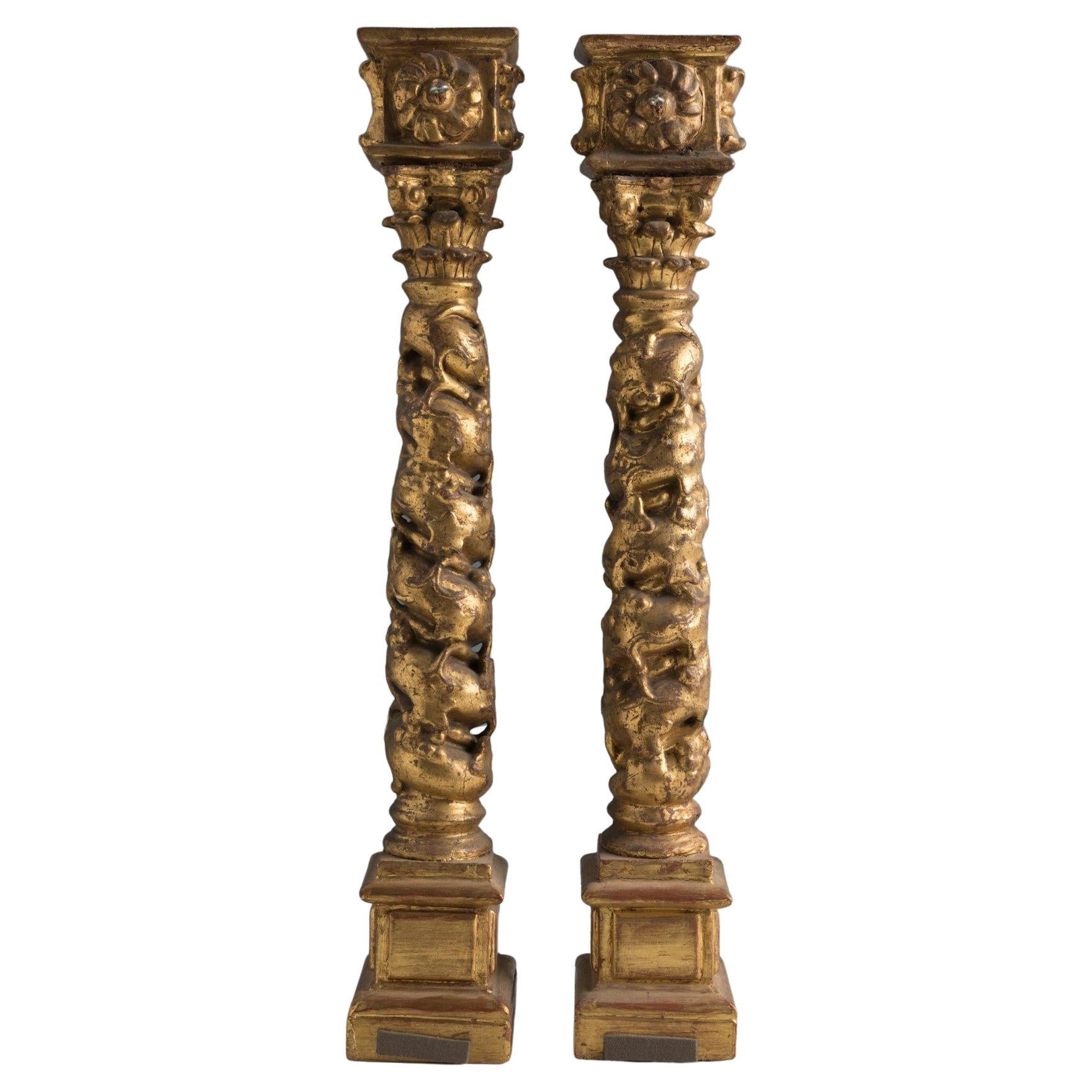 Pair of Spanish giltwood Baroque Solomonic antique columns