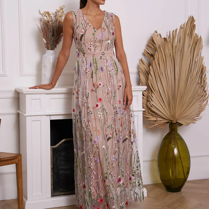 Romantic long nude dress with elegant embroidered floral motif by Choklate Paris