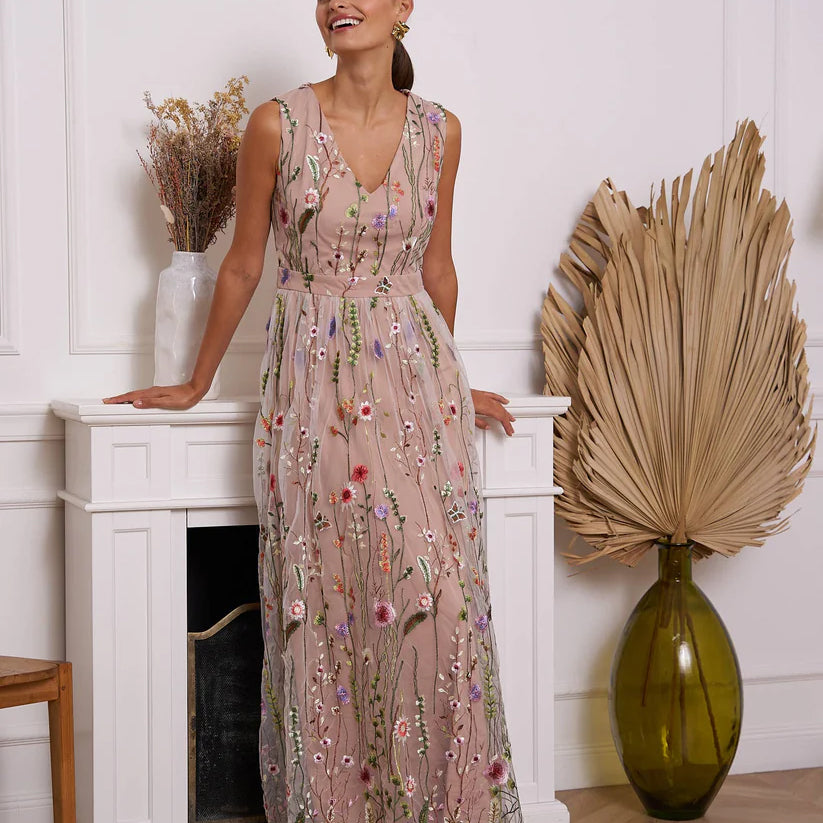 Romantic long nude dress with elegant embroidered floral motif by Choklate Paris