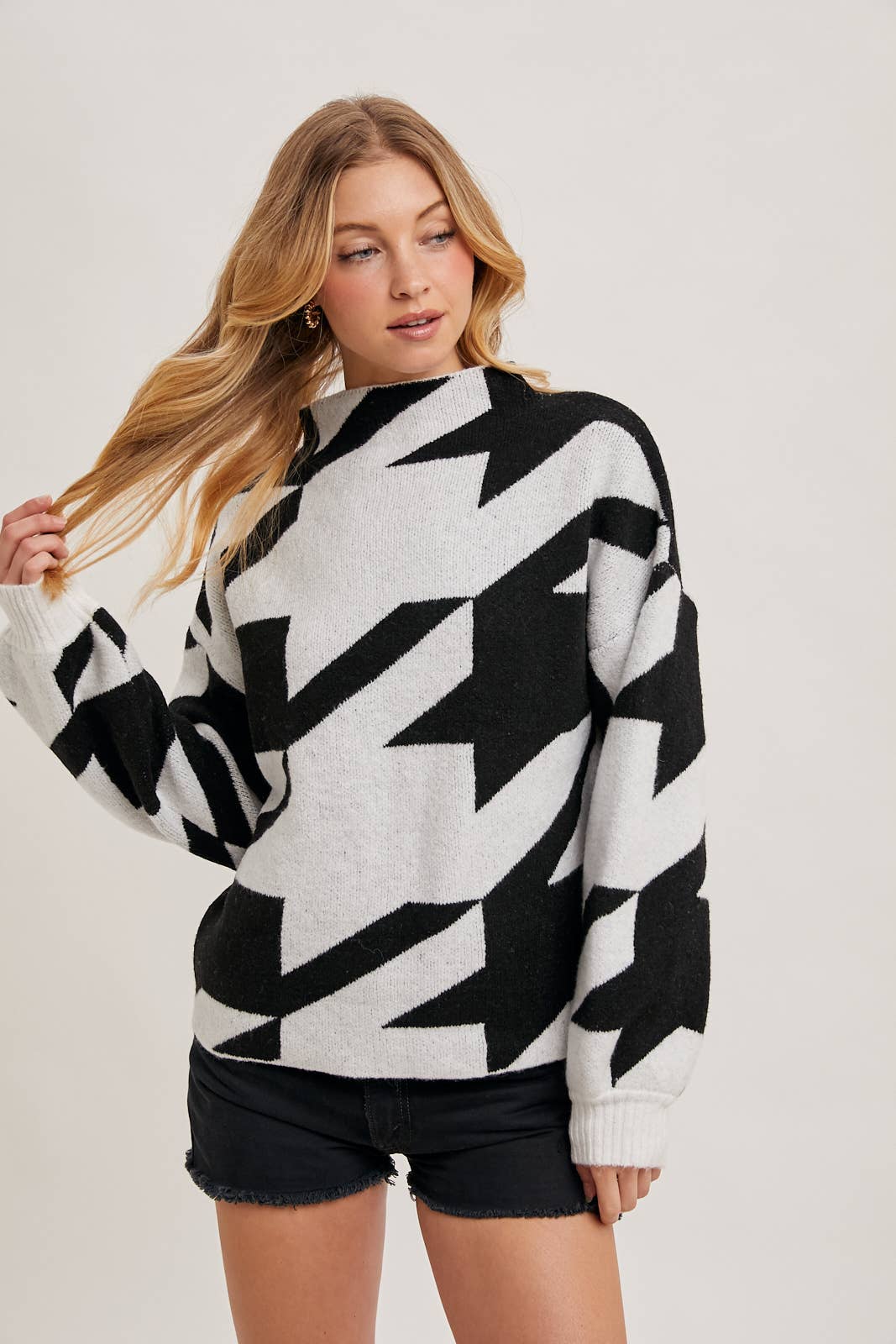 HOUNDSTOOTH MOCK NECK LOOSE FIT KNIT SWEATER IN BLACK AND WHITE available for shopping small in Northern Virginia