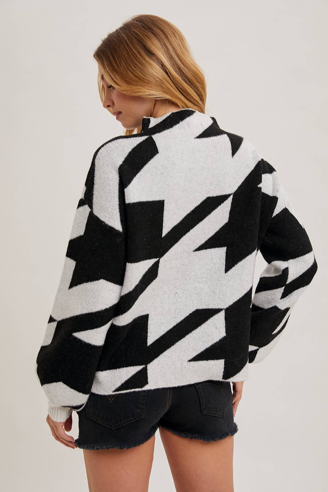 HOUNDSTOOTH MOCK NECK LOOSE FIT KNIT SWEATER IN BLACK AND WHITE available for shopping small in Northern Virginia